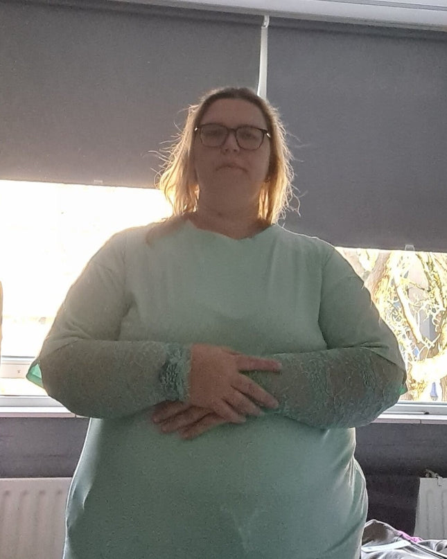 Kante top met roosjes