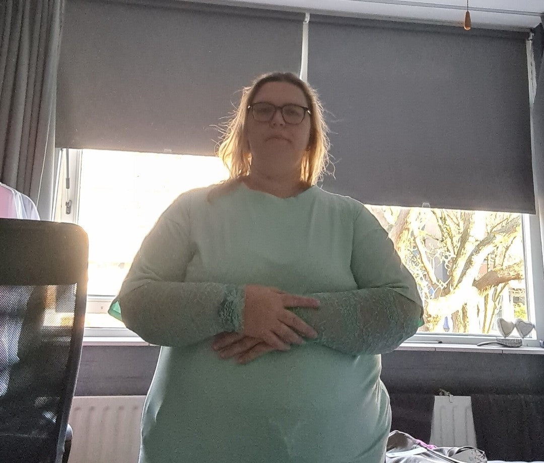 Kante top met roosjes