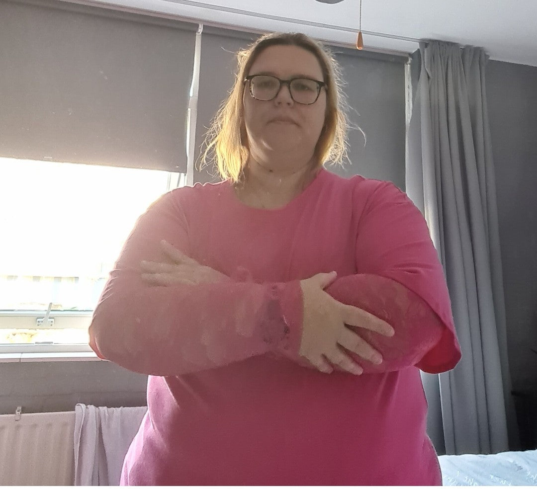 Kante top met roosjes