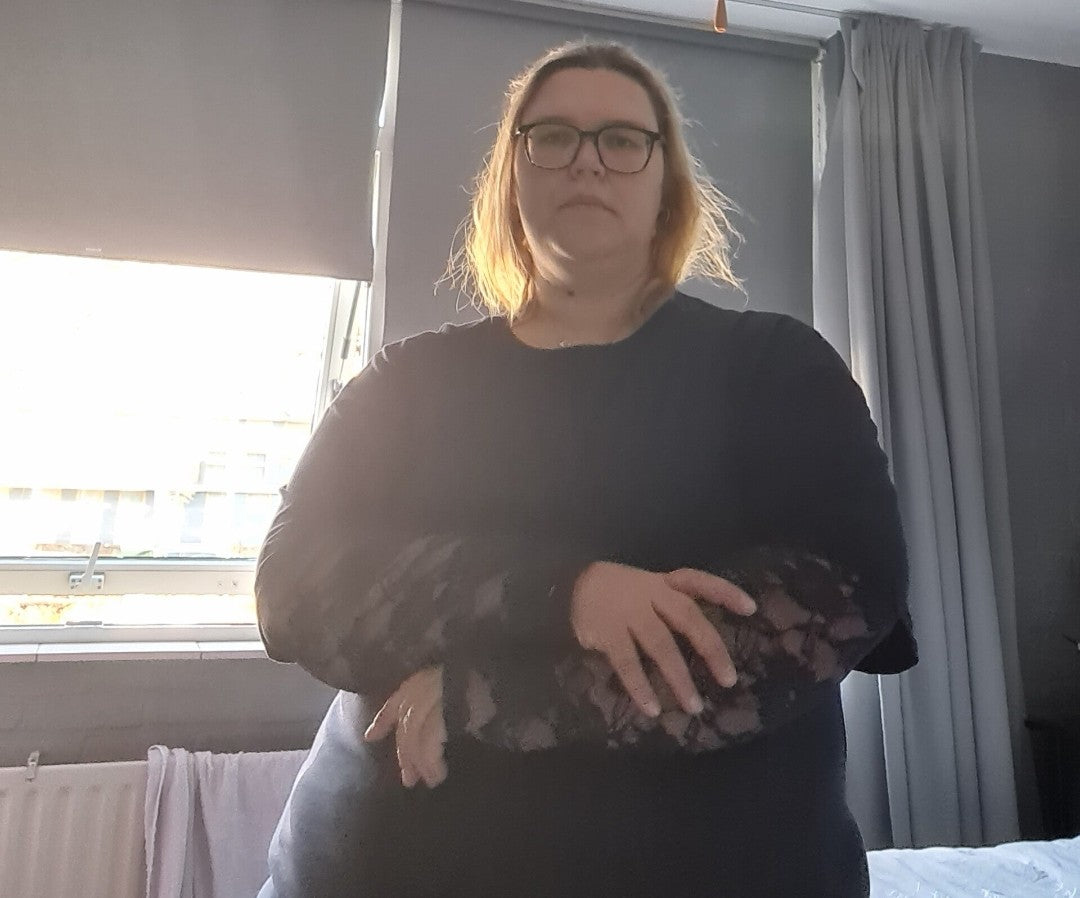 Kante top met roosjes