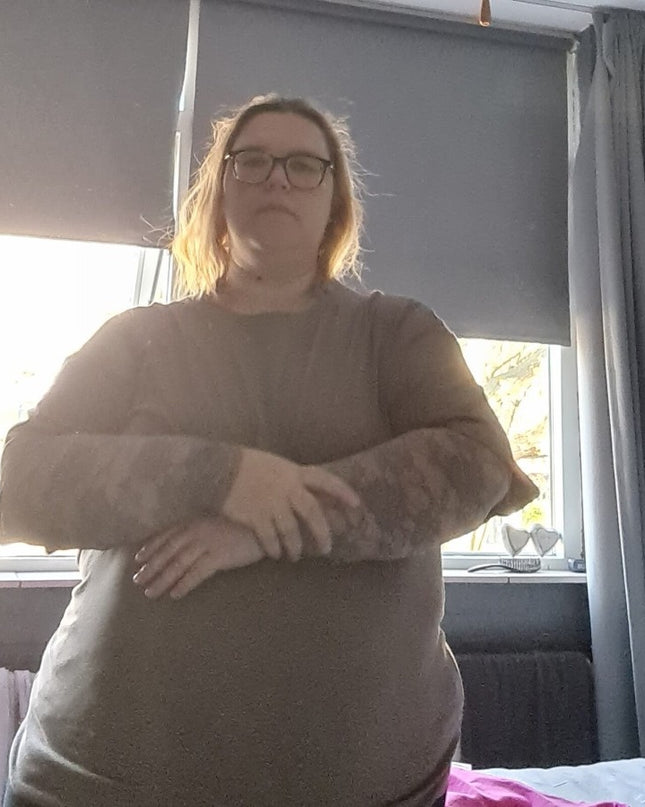 Kante top met roosjes