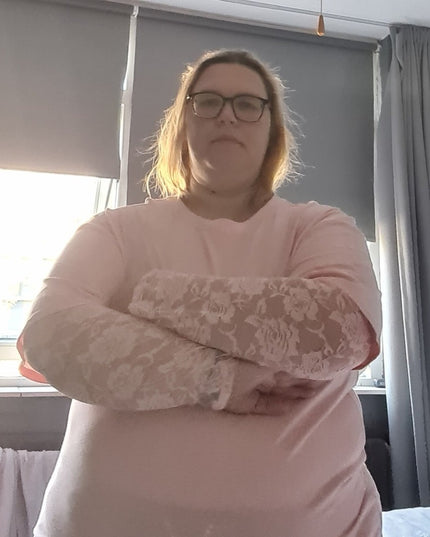 Kante top met roosjes