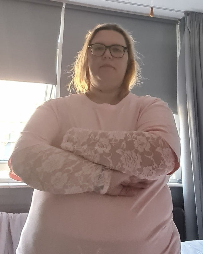 Kante top met roosjes