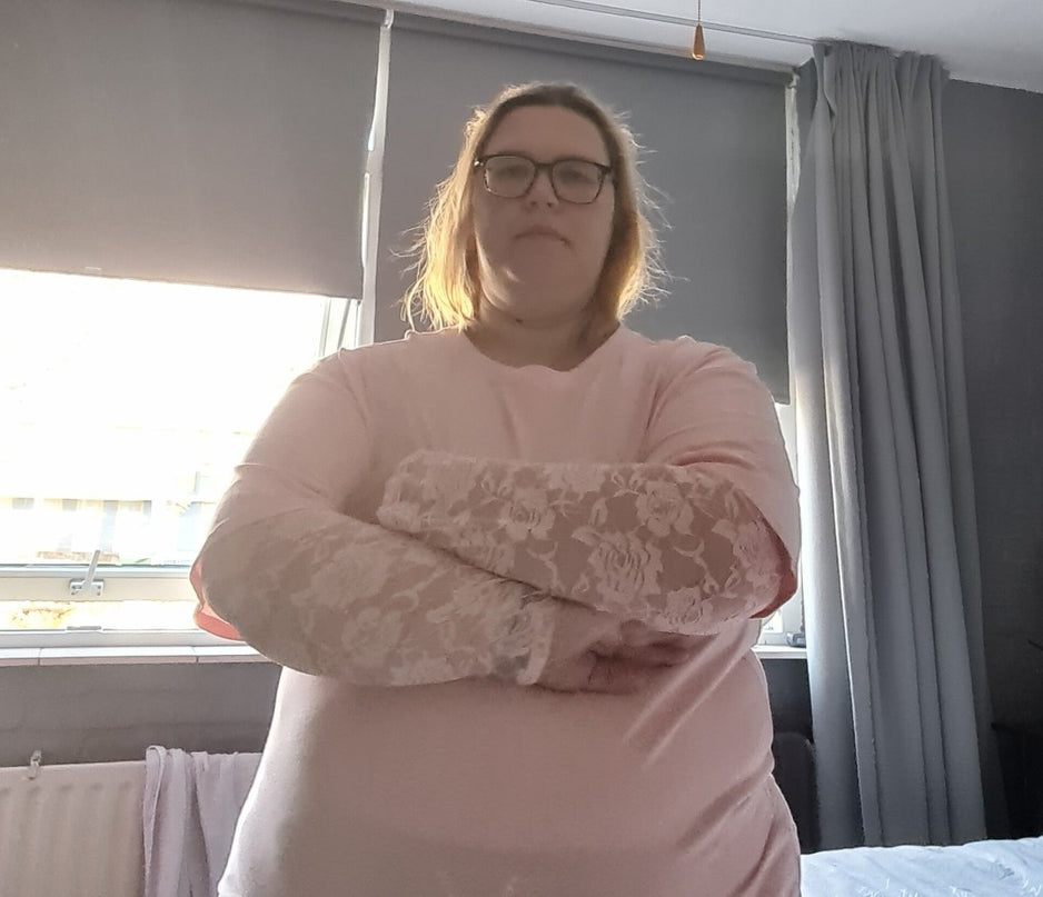 Kante top met roosjes