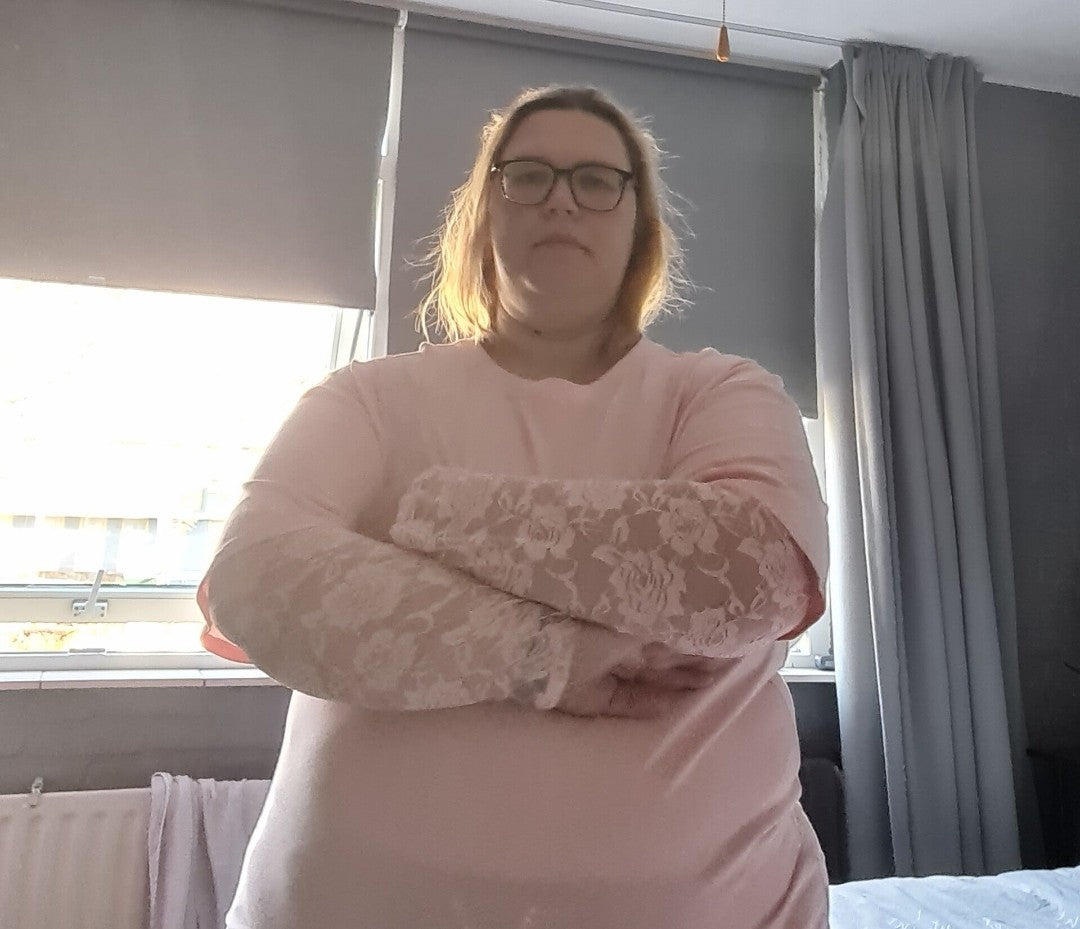 Kante top met roosjes